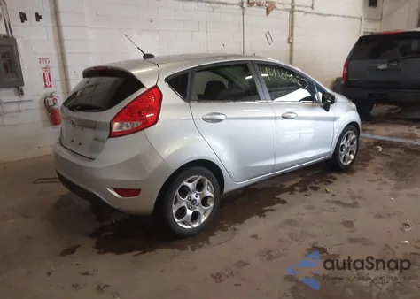 2013 Ford Fiesta Titanium z USA, uszkodzony, nr VIN 3FADP4FJXDM199751